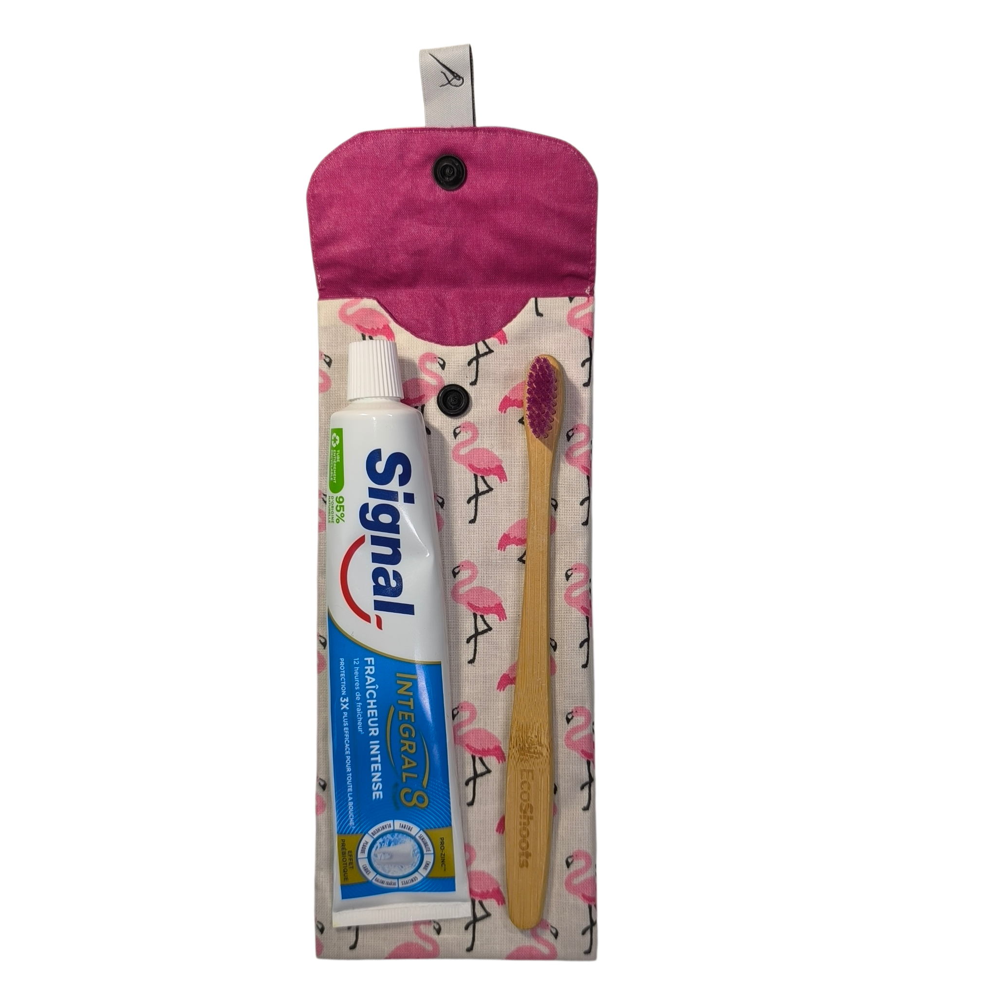 étui à brosse à dents flamand rose ouvert tube de dentifrice