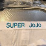 broderie sur slip turquoise et blanc