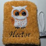gant de toilette orange avec une chouette brodée